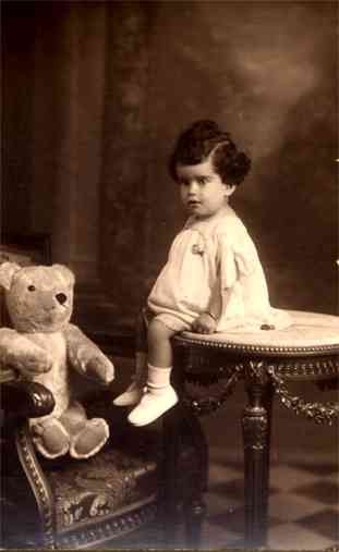 Teddy Bear in Arm Chair Girl on Table Real Photo