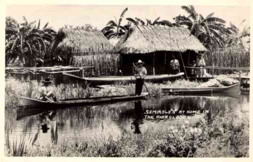 Seminole Indians in Canoe Everglades FL RP