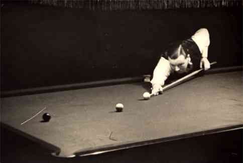 Player Over Table with Billiard Cue Real Photo