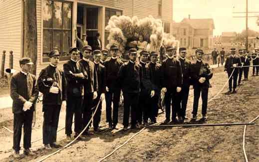 Uniformed Men with Flowers Real Photo