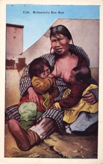 Eskimo Nursing Mother Holding Two Babies