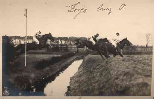 Horse Racers Running over Ditch Real Photo
