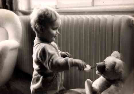 Girl Feeding Teddy Bear With Baby Bottle RPPC