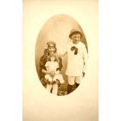 Children with Doll RPPC