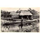 Seminole Indians in Canoe Everglades FL RP